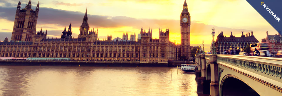 Solnedgang over Westminster Palace og Big Ben ved floden Thames i London.
